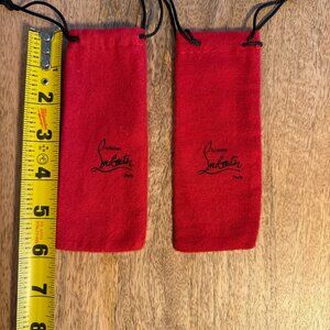 NEW authentic Christian Louboutin, shoe lace bags, in red and cloth